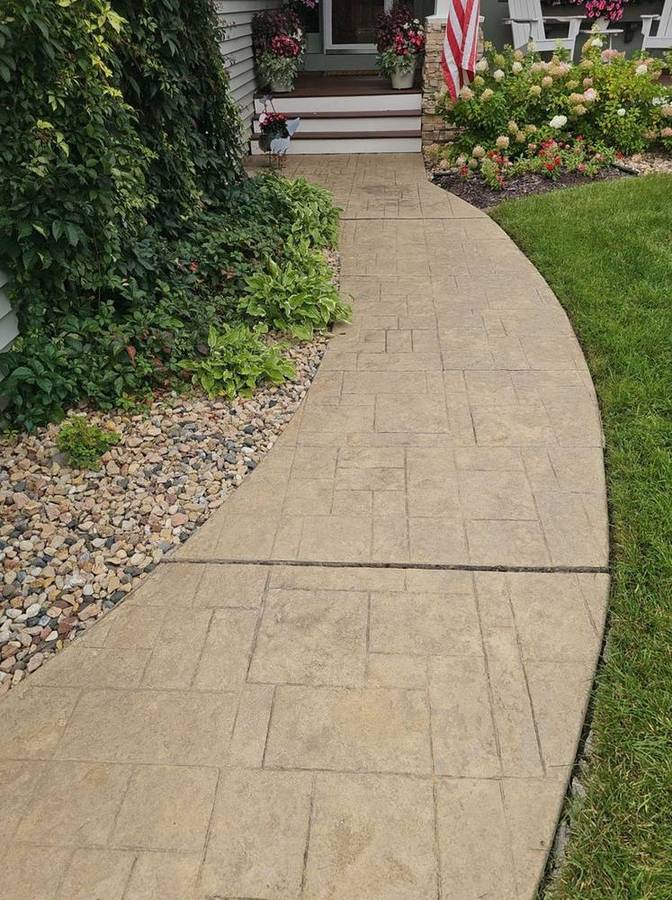 Before: faded stamped concrete walkway